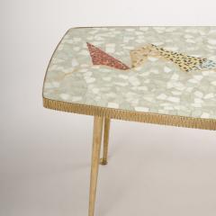 A Mid Century German coffee table with mosaic top on tapered brass legs - 1697313
