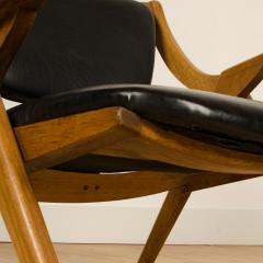 A Mid Century Modern teak lounge chair circa 1950 - 1790228