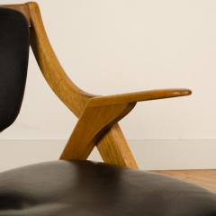 A Mid Century Modern teak lounge chair circa 1950 - 1790255