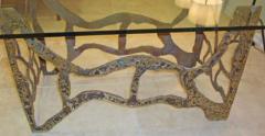A Modernist Dining Table in Sand Cast Bronze and Glass - 256479