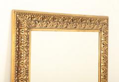 A Nineteenth Century continental relief and gilt carved mirror  - 3477158