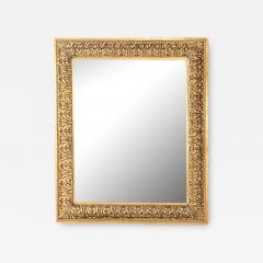 A Nineteenth Century continental relief and gilt carved mirror  - 3479085