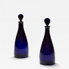 A PAIR OF BRISTOL BLUE SPIRIT DECANTERS - 4290640