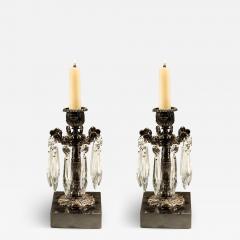 A PAIR OF BRONZED DOLPHIN CANDLESTICKS - 3789359