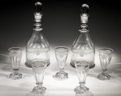 A PAIR OF DECANTERS OF NAUTICAL INTEREST WITH FIVE MATCHING GLASSES - 4340879