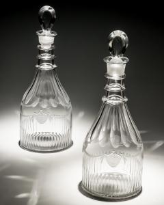 A PAIR OF DECANTERS OF NAUTICAL INTEREST WITH FIVE MATCHING GLASSES - 4340907