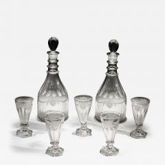 A PAIR OF DECANTERS OF NAUTICAL INTEREST WITH FIVE MATCHING GLASSES - 4344266