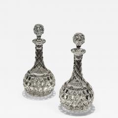 A PAIR OF ELABORATELY CUT VICTORIAN DECANTERS - 3789369