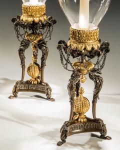 A PAIR OF GILT BRONZE GRIFFIN STORM LIGHTS - 3960388