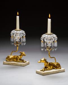 A PAIR OF GILT WOOD GREYHOUND CANDLESTICKS - 4424925