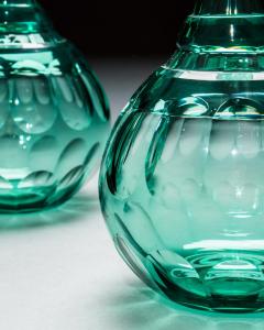 A PAIR OF GREEN SHAFT GLOBE DECANTERS - 4340943