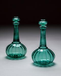 A PAIR OF GREEN SHAFT GLOBE DECANTERS - 4580807