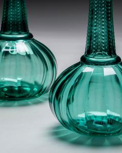A PAIR OF GREEN SHAFT GLOBE DECANTERS - 4580808
