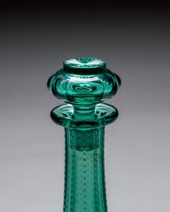A PAIR OF GREEN SHAFT GLOBE DECANTERS - 4580809