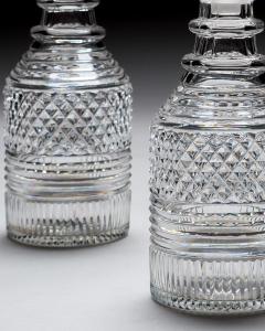 A PAIR OF HEAVILY CUT REGENCY SPIRIT DECANTERS - 4513154