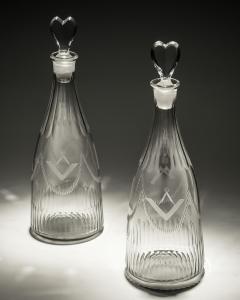 A PAIR OF MASONIC TAPERED DECANTERS - 3787784