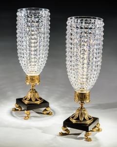 A PAIR OF REGENCY CUT GLASS STORM SHADES ON ORMOLU BRONZE BASES - 3791006