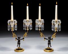 A PAIR OF REGENCY ORMOLU BRONZE BOY CANDELABRA - 4399376