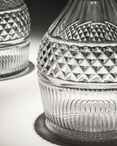 A PAIR OF REGENCY SLICE FLUTE DECANTERS WITH DIAMOND CUT BAND - 3793702