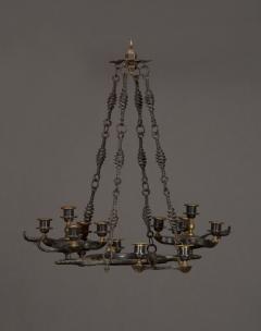 A PATINATED BRONZE FOURTEEN LIGHT CHANDELIER IN THE ANCIENT ROMAN TASTE - 3914189