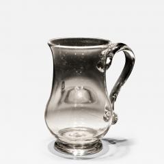 A PLAIN 18TH CENTURY GLASS MUG - 3796601