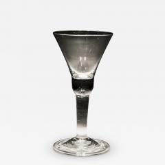 A PLAIN STEM GLASS WITH BELL BOWL FOLDED FOOT - 3799923