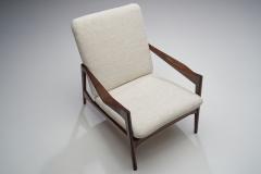 A Pair of Danish Ribbed Back Lounge Chairs Denmark 1960s - 1778561
