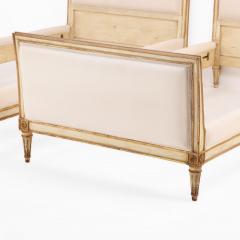 A Pair of French Louis XVI style Painted and Gilt Twin Beds C 1940  - 4541000