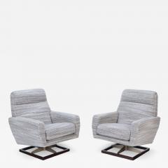 A Pair of Italian swivel lounge chairs with new fabric C 1970 - 2920587