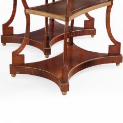 A Pair of Regency style Rosewood Leather Bronze Mounted Three Tier End Tables  - 4580944