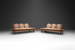 A Pair of Wooden Sofas with Round Cushions Indonesia 1960s - 4021889