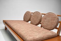 A Pair of Wooden Sofas with Round Cushions Indonesia 1960s - 4021893