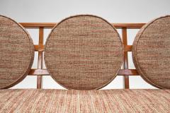 A Pair of Wooden Sofas with Round Cushions Indonesia 1960s - 4021895