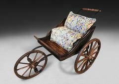 A Polychrome early 19th century child s three wheeled pushchair - 4493453
