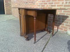 A Quality Drop Leaf Victorian Oak Dining Table - 4192456