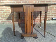 A Quality Drop Leaf Victorian Oak Dining Table - 4192458