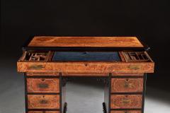 A RARE CHINESE EXPORT AMBOYNA AND EBONY CAMPAIGN KNEEHOLE DESK - 2542815