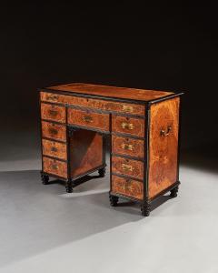 A RARE CHINESE EXPORT AMBOYNA AND EBONY CAMPAIGN KNEEHOLE DESK - 2542819