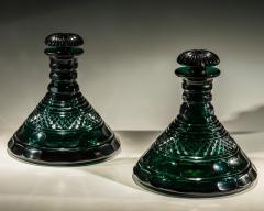 A RARE PAIR OF HEAVILY CUT EMERALD GREEN DECANTERS - 3787914