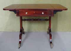 A REGENCY ROSEWOOD SOFA TABLE - 4221790