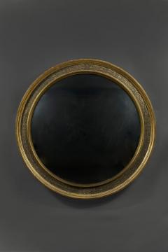 A Renaissance Revival Ebonized and Parcel Gilt Circular Convex Mirror - 4518322