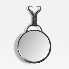 A Round Steel Mirror - 3878504