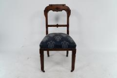 A Set of Four Aesthetic Movement Oak Dining Chairs with Carved Decoration - 4192485