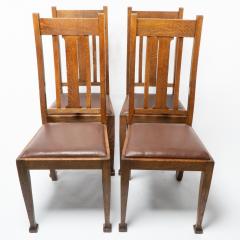 A Set of Four Arts Crafts Oak Dining Chairs with Comfortable Shaped Backs - 4192492