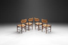 A Set of Four Dining Chairs with Woven Straw Seats and Backs Europe ca 1950s - 3458583
