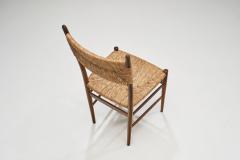 A Set of Four Dining Chairs with Woven Straw Seats and Backs Europe ca 1950s - 3458584