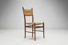 A Set of Four Dining Chairs with Woven Straw Seats and Backs Europe ca 1950s - 3458585