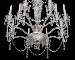 A TWELVE LIGHT EDWARDIAN CHANDELIER - 3796074