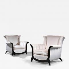 A UNUSUAL PAIR OF FRENCH ART DECO EBONISED ARMCHAIRS IN A CRUSHED VELVET - 3505346
