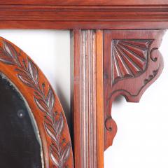 A Victorian carved mahogany wall mirror with shaped beveled mirror circa 1880  - 2276219